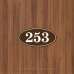 Табличка овальна номер кабінету коричнева TNN-0025